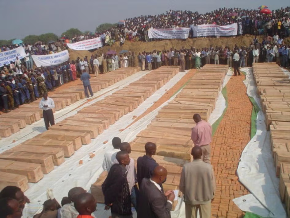 Rows of coffins at the mass funeral for Gatumba Massacre victims, August 2004